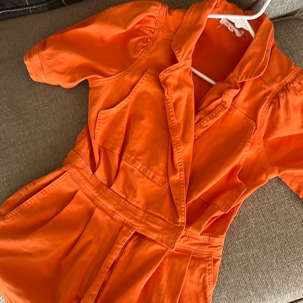 Orange denim romper. Worn twice. In good condition. Perfect for game days!